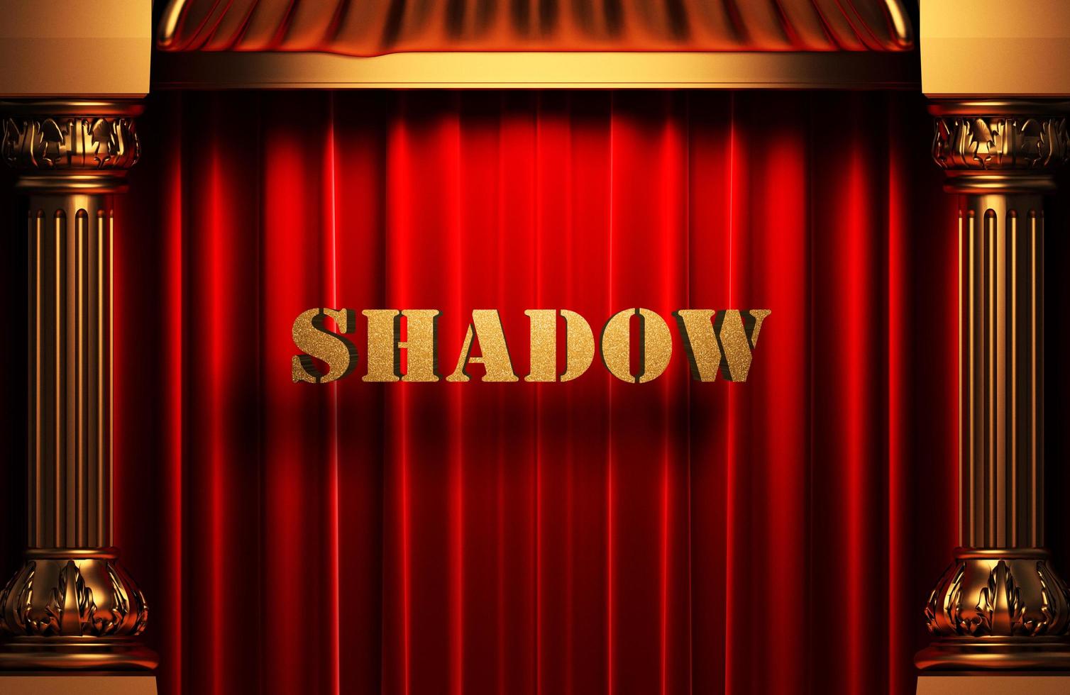 Schatten goldenes Wort auf rotem Vorhang foto