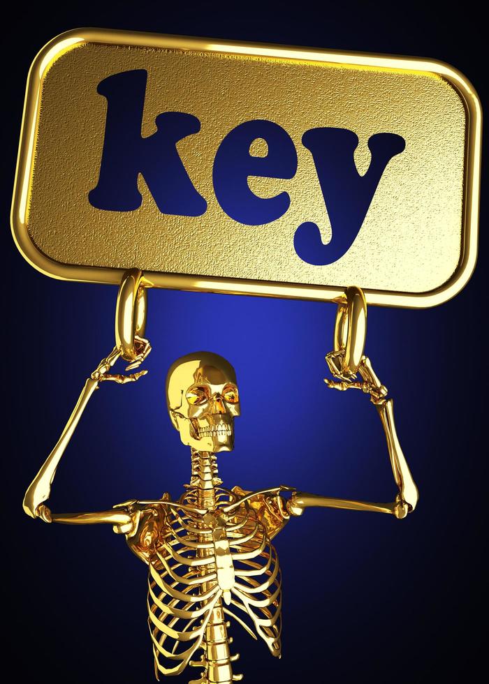 Schlüsselwort und goldenes Skelett foto