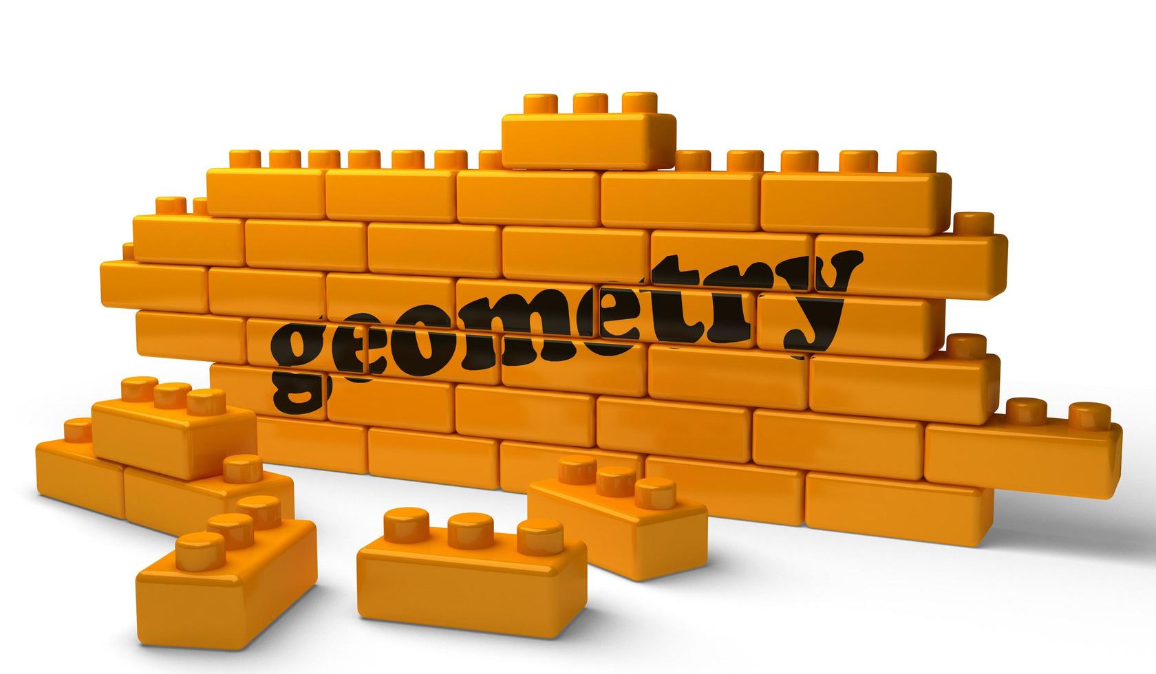 Geometriewort auf gelber Backsteinmauer foto