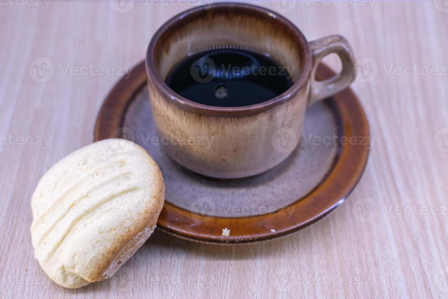 Tasse Kaffee und Kekse foto