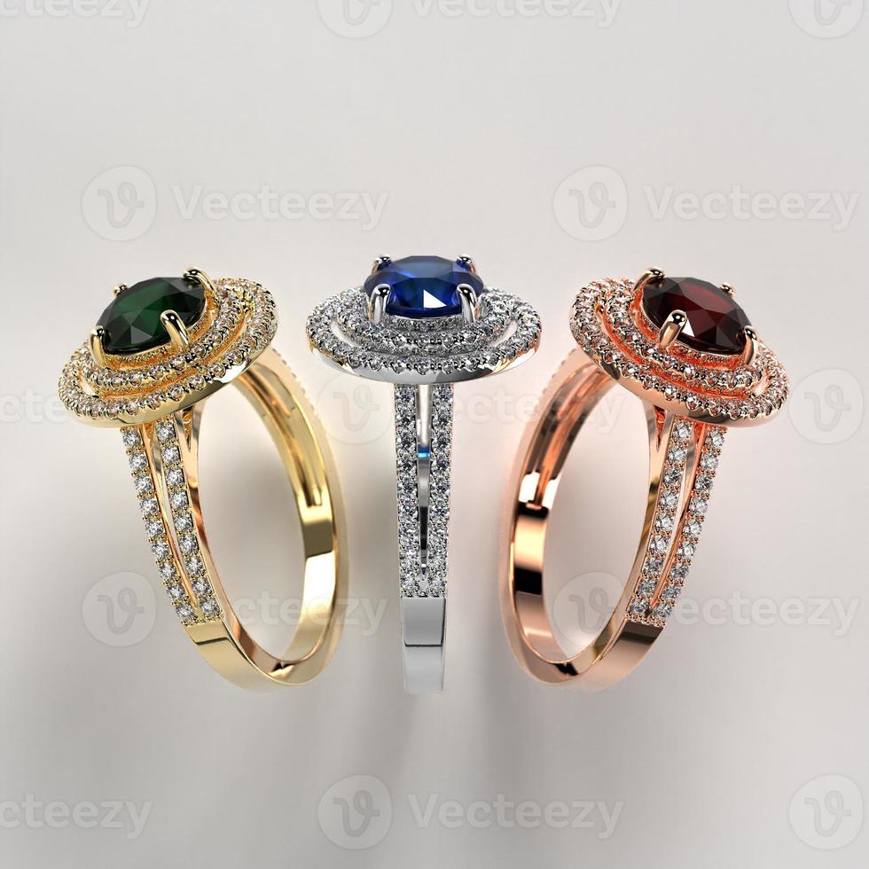gestapelter dreifarbiger doppelter Halo-Ring aus Metall mit seitlicher Perspektive aus farbigen Edelsteinen foto