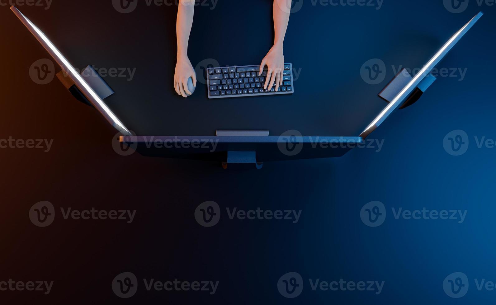 Draufsicht auf einen Arbeitsbereich mit Monitoren und Händen, die die Tastatur berühren foto
