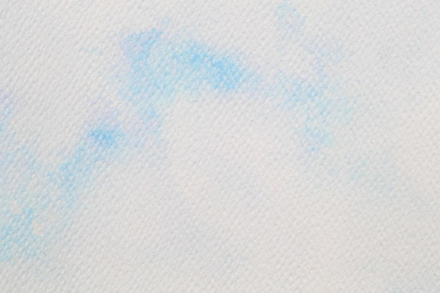blaues Aquarell auf weißem Papier, abstrakter Hintergrund foto