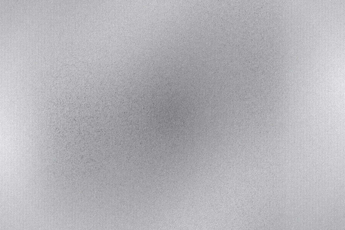 gebürstete silberne Blechoberfläche, abstrakter Texturhintergrund foto