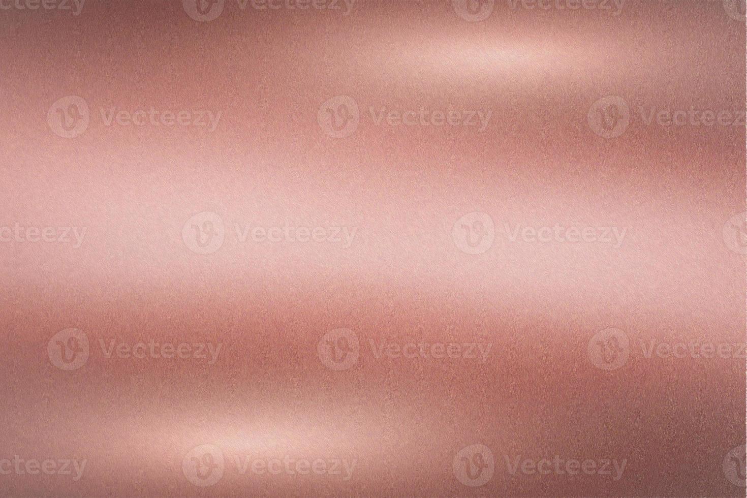 gebürstete roségoldmetallische Wand mit zerkratzter Oberfläche, abstrakter Texturhintergrund foto