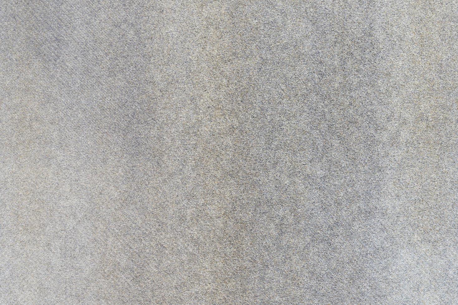 Textur der rauen alten grauen Sandwäsche, Detailstein, abstrakter Hintergrund foto