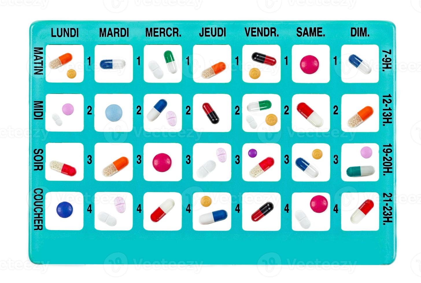 wöchentliche medikamente in einer pillendose für den täglichen gebrauch auf französisch foto