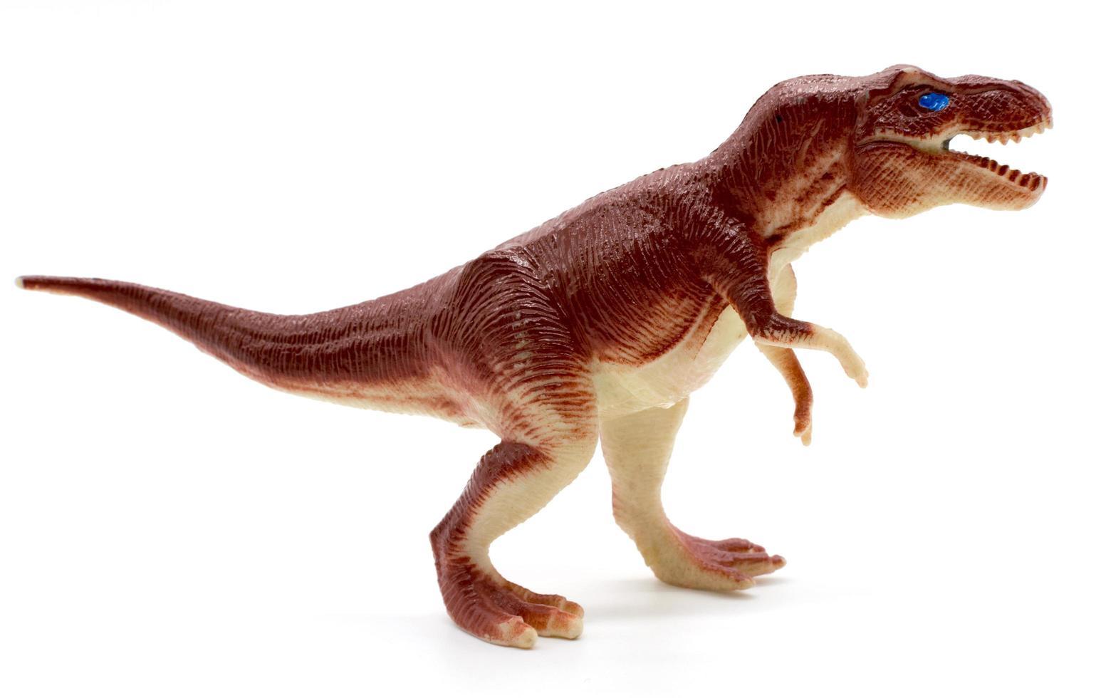 Tyrannosaurus-Dinosaurierspielzeug auf weißem Hintergrund foto