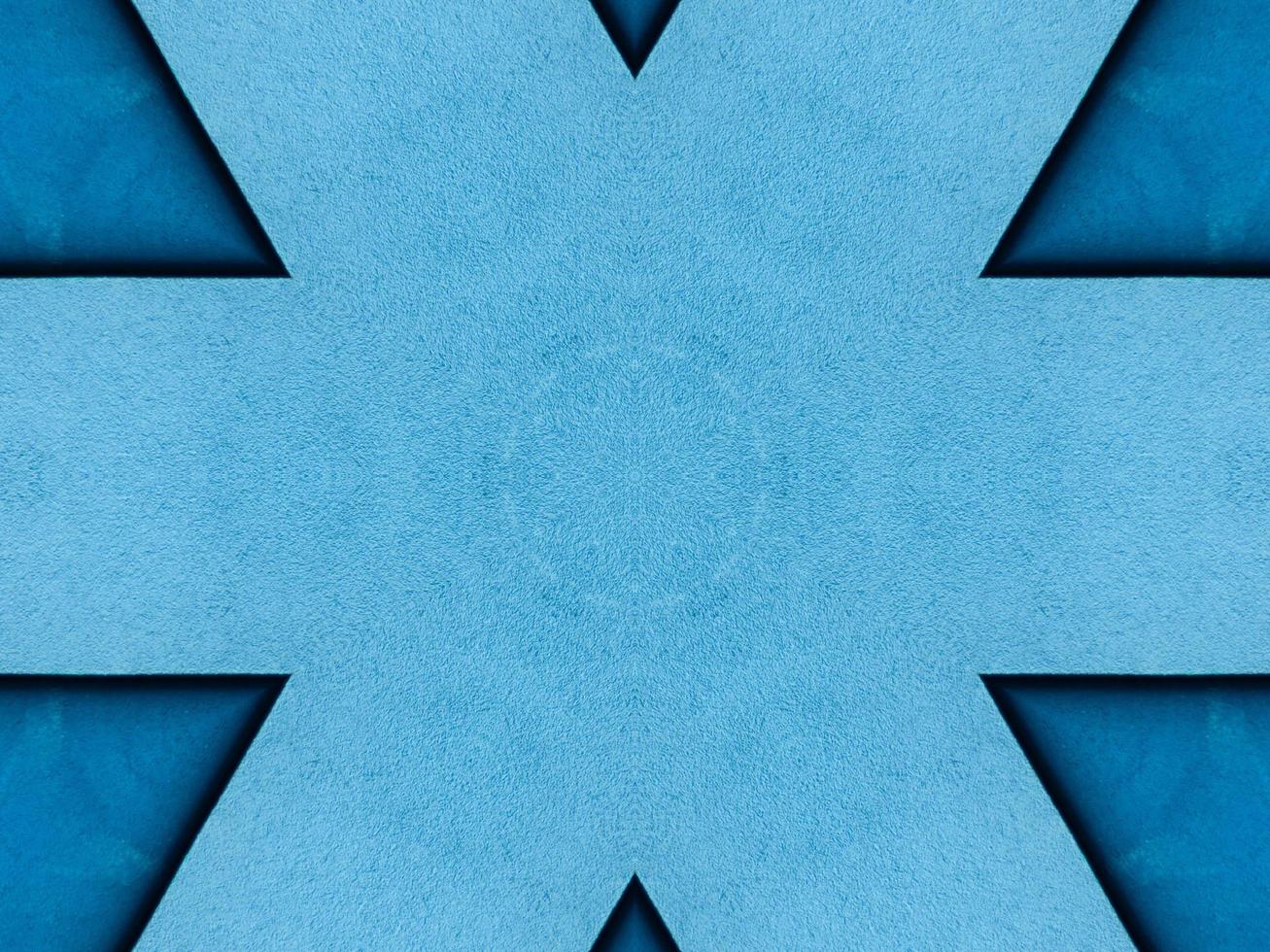 einfaches blaues Kaleidoskopmuster. abstrakter Hintergrund. kostenloses Foto. foto