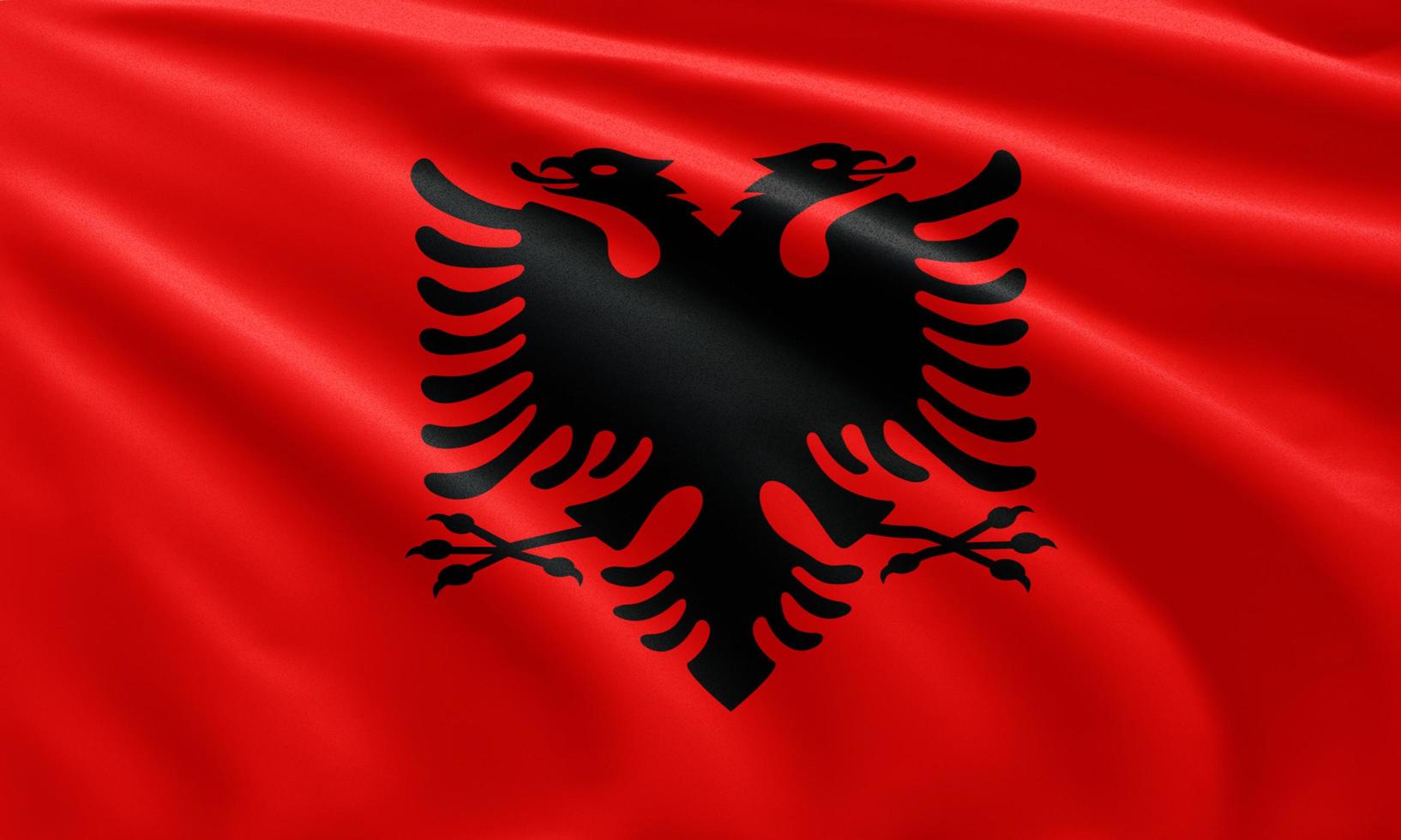 Nahaufnahme der wehenden Flagge Albaniens foto