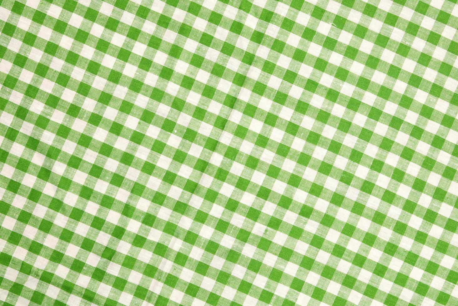 grün karierter Tischdeckenhintergrund foto