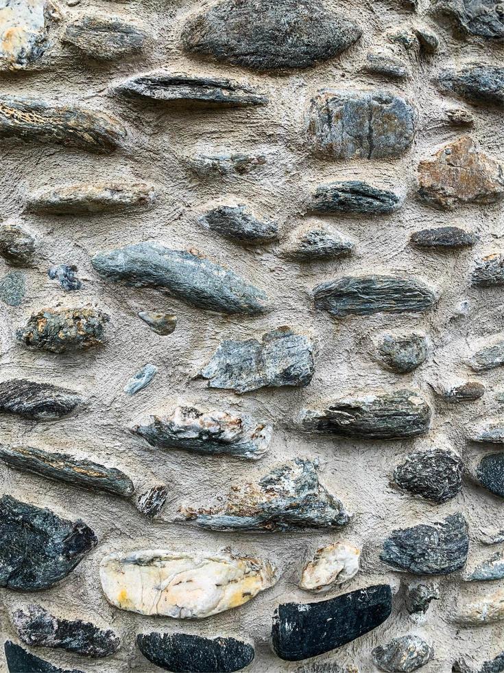 Hintergrund der alten Steinmauer. steinerne Kulisse foto