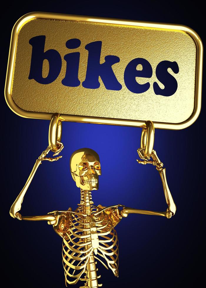 Fahrradwort und goldenes Skelett foto