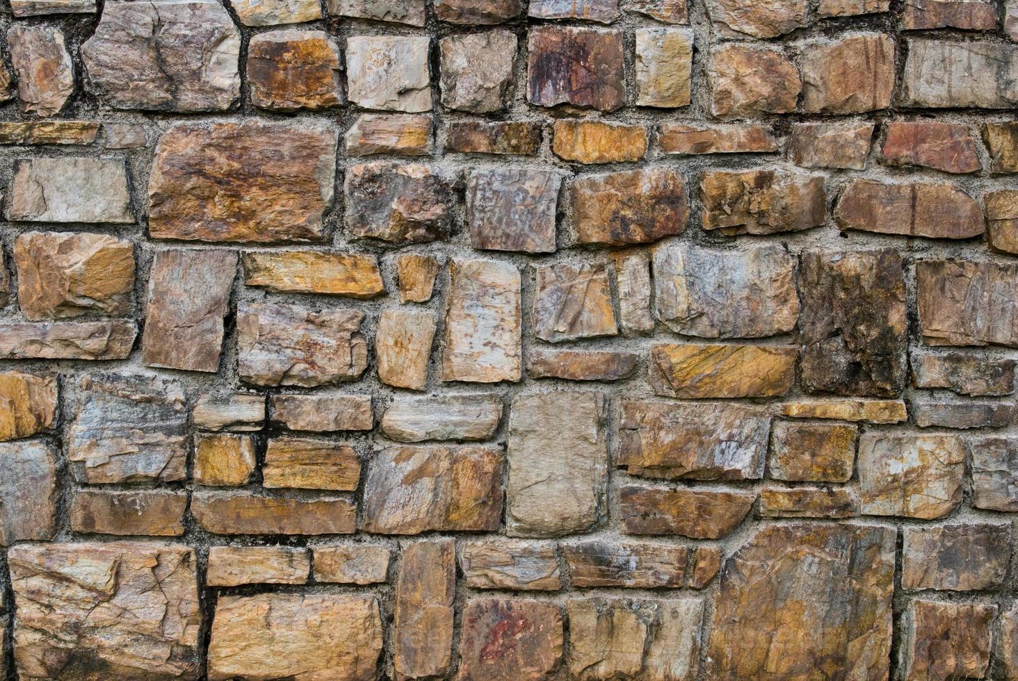 Muster der alten Steinmauer foto