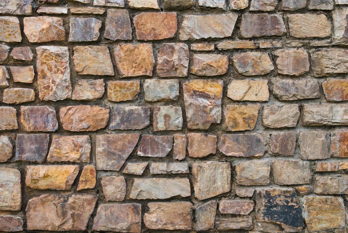 Muster der alten Steinmauer foto