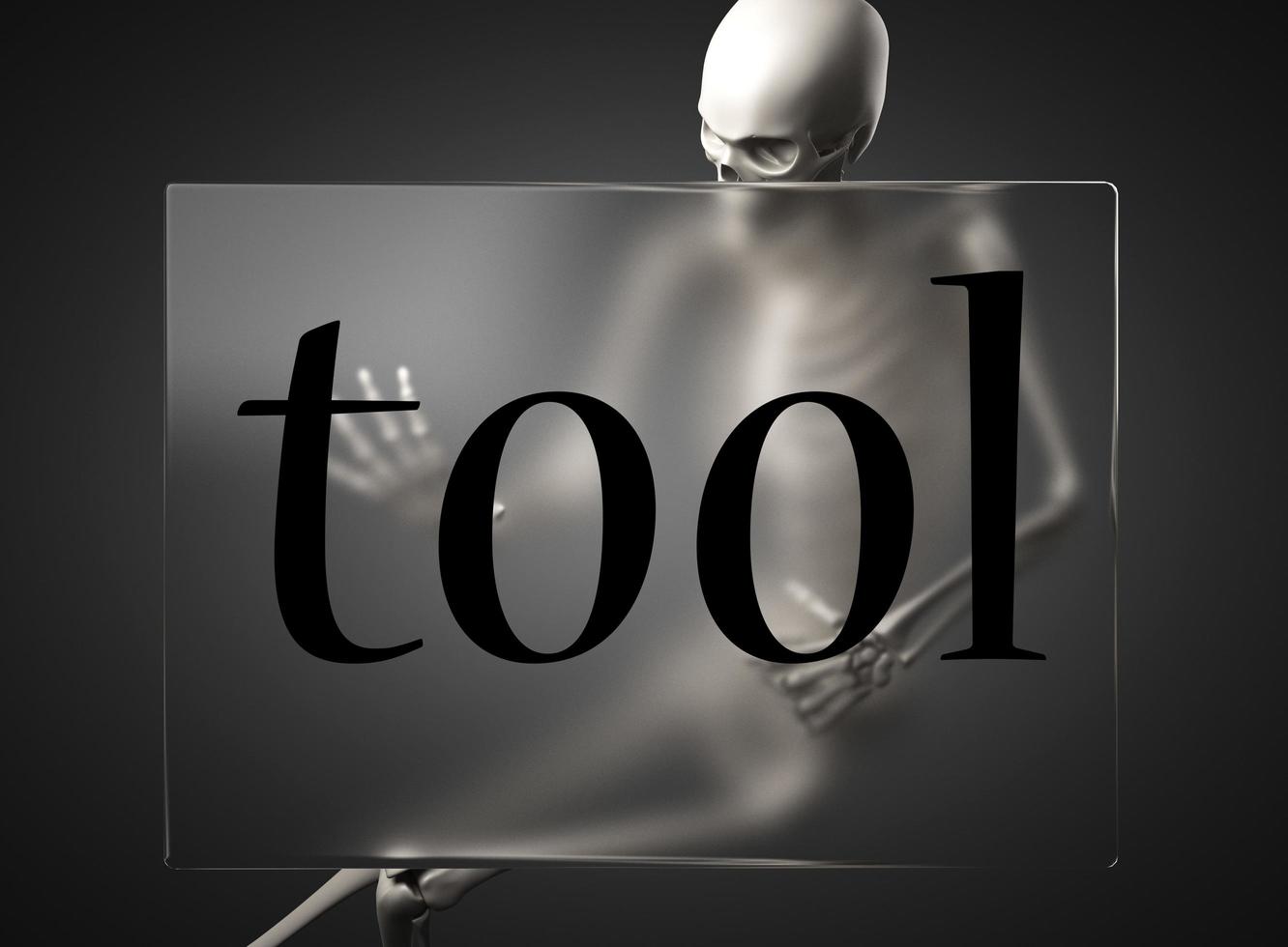 Werkzeugwort auf Glas und Skelett foto