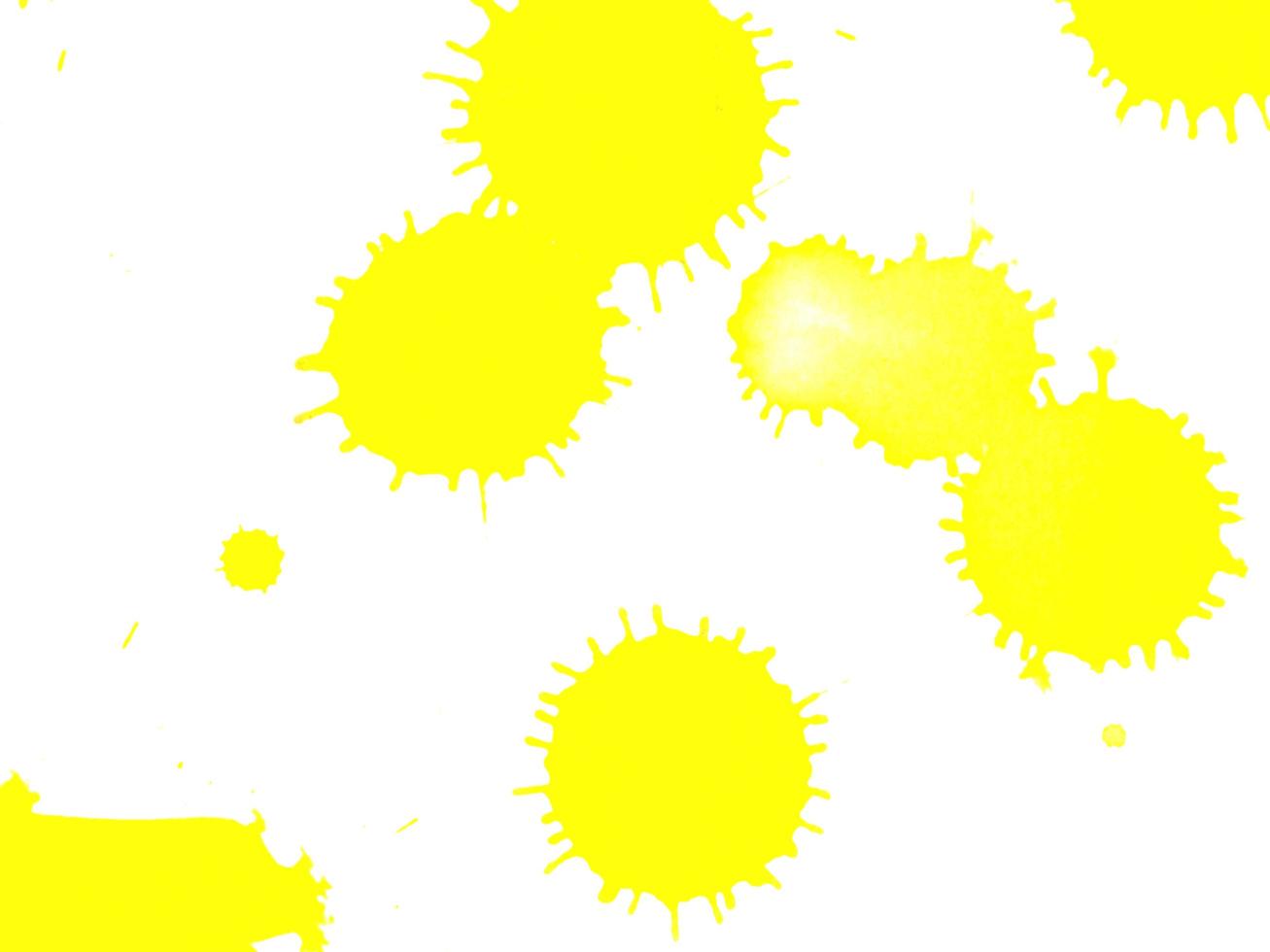 Punkt gelbe Farbe Aquarellfarbe spritzt auf weißem Papierhintergrund foto