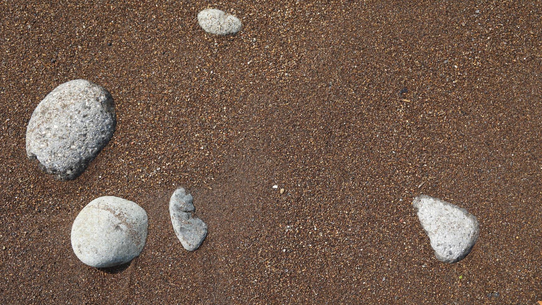 Flussfelsenhintergrund. Seastone-Muster. Steinstruktur foto