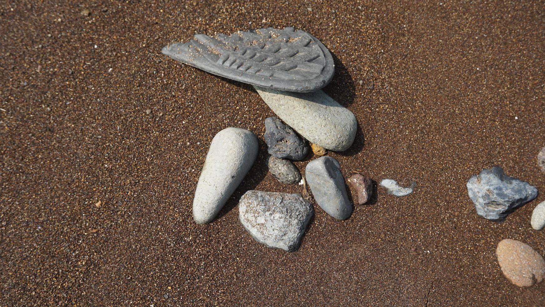 Flussfelsenhintergrund. Seastone-Muster. Steinstruktur foto