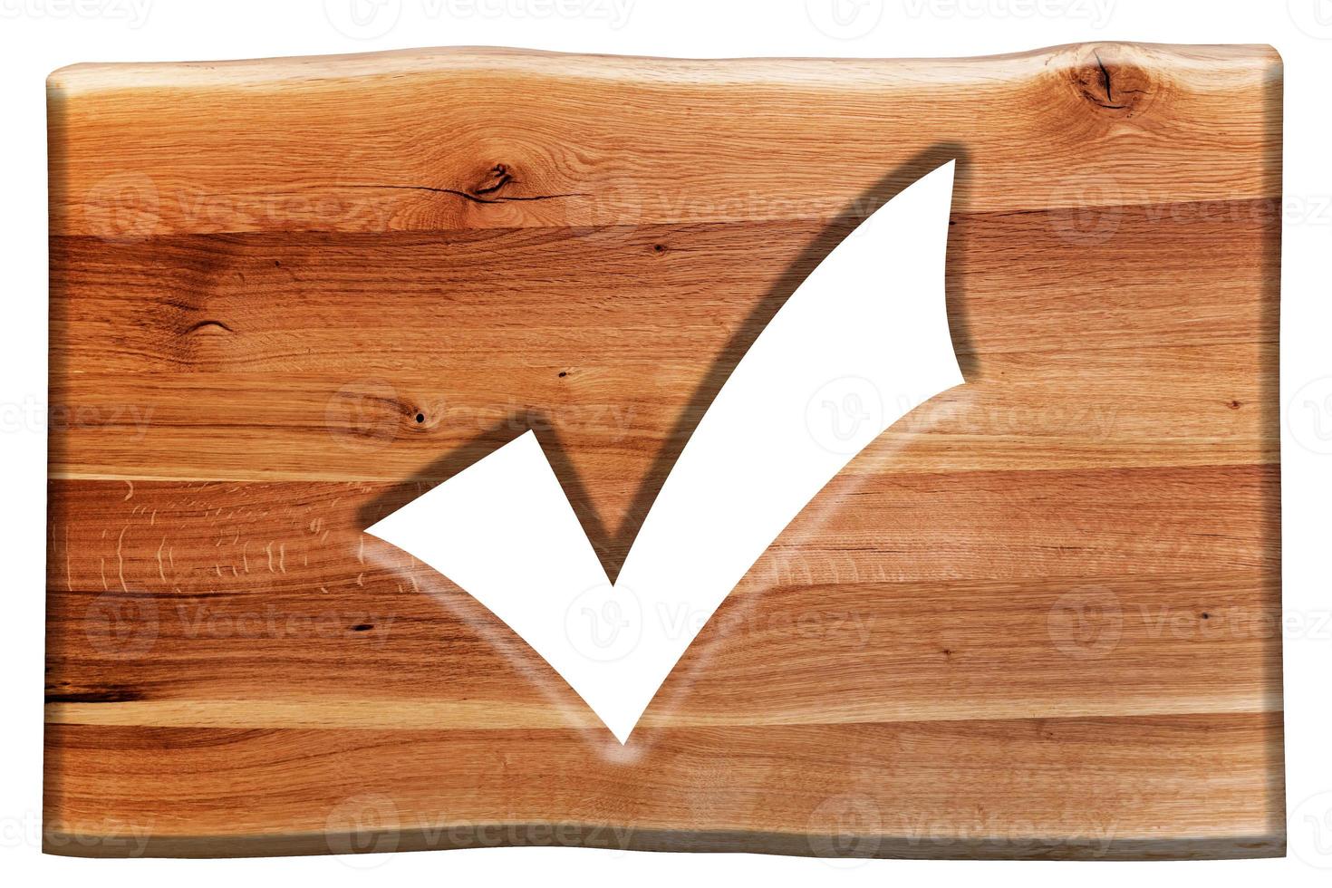 Häkchen, Häkchen-Symbol in Holzbrett geschnitten, isoliert auf weiss foto