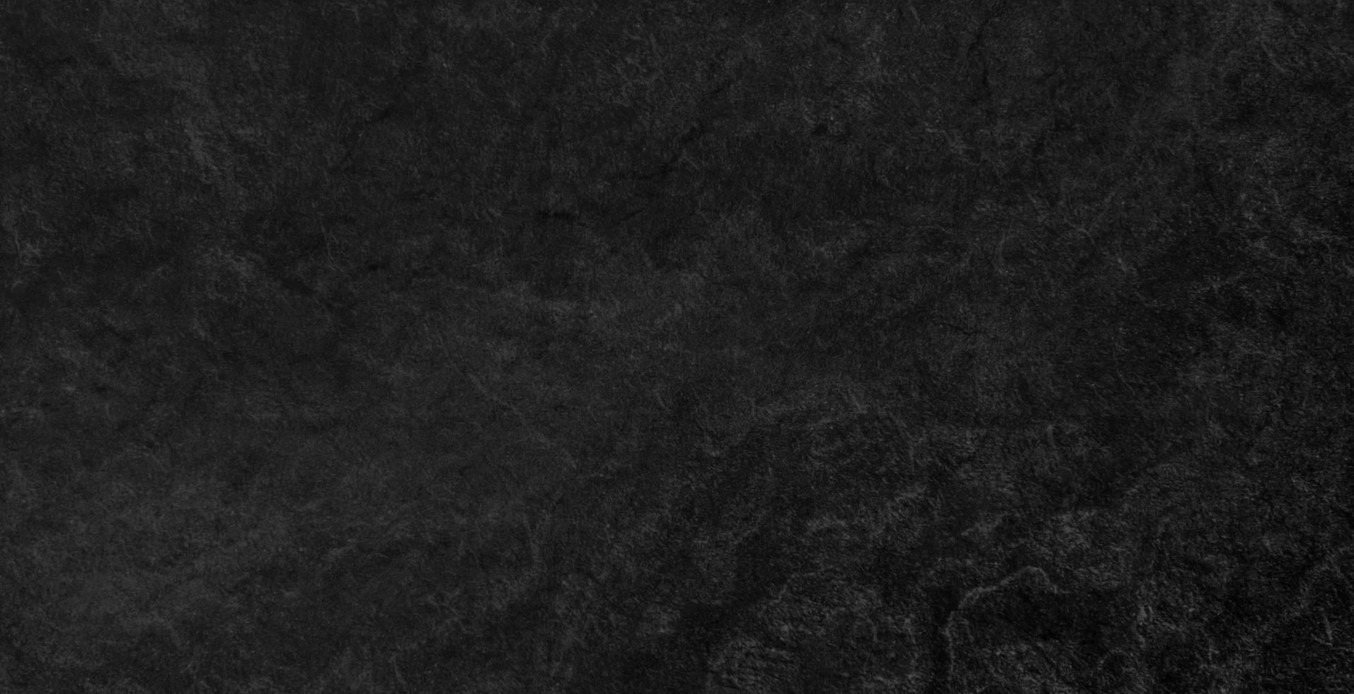 dunkelgrauer schwarzer schieferhintergrund oder textur foto