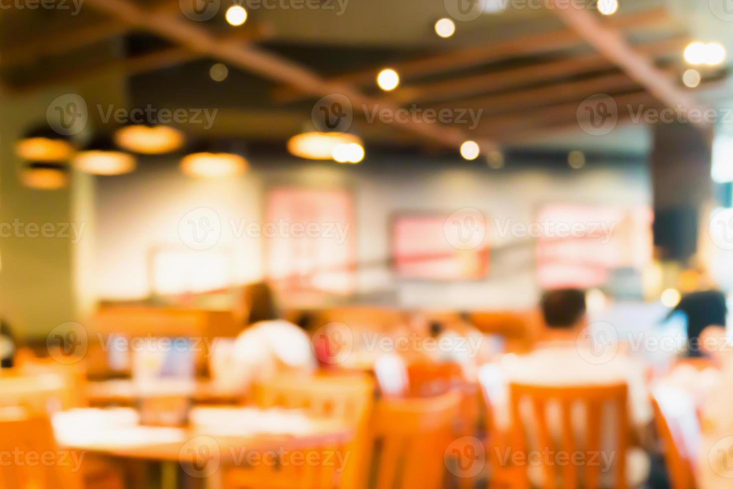 abstraktes café café restaurant verwischen hintergrund mit bokeh licht foto