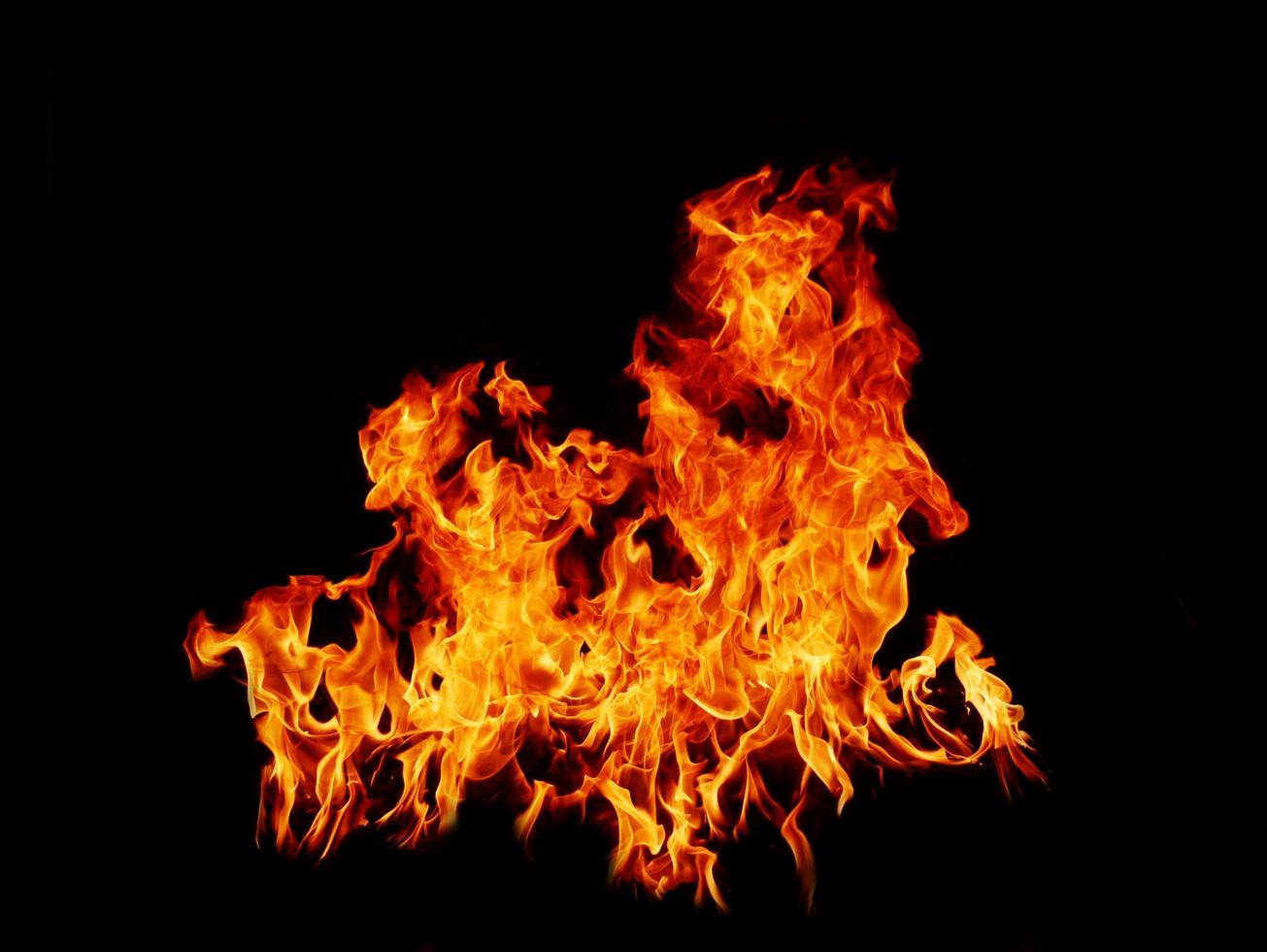 Flamme Flammentextur für seltsame Form Feuerhintergrund Flammenfleisch, das vom Herd oder vom Kochen verbrannt wird. Gefahrengefühl abstrakter schwarzer Hintergrund geeignet für Banner oder Werbung. foto