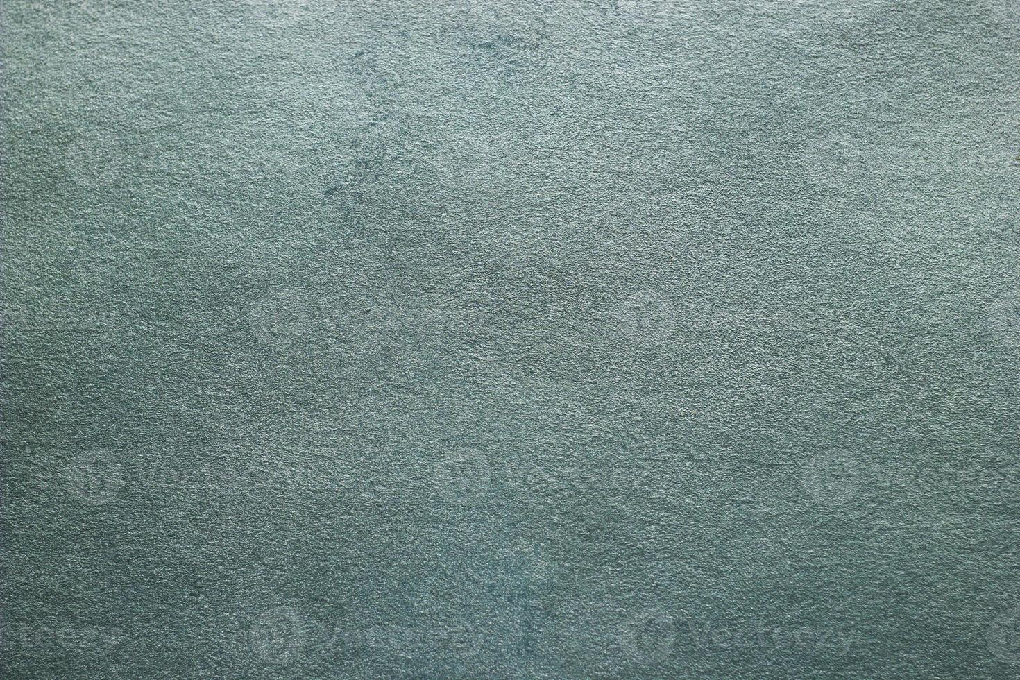 abstrakte textur von dekorativem putz. Grunge-Hintergrund der Stuckstruktur. blau genarbte Oberfläche foto