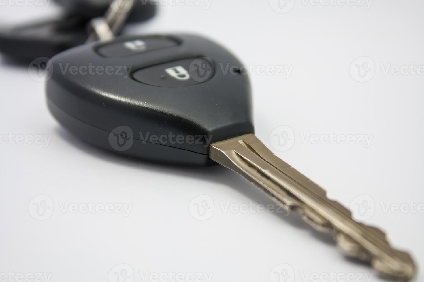 Autoschlüssel isoliert auf weißem Hintergrund foto