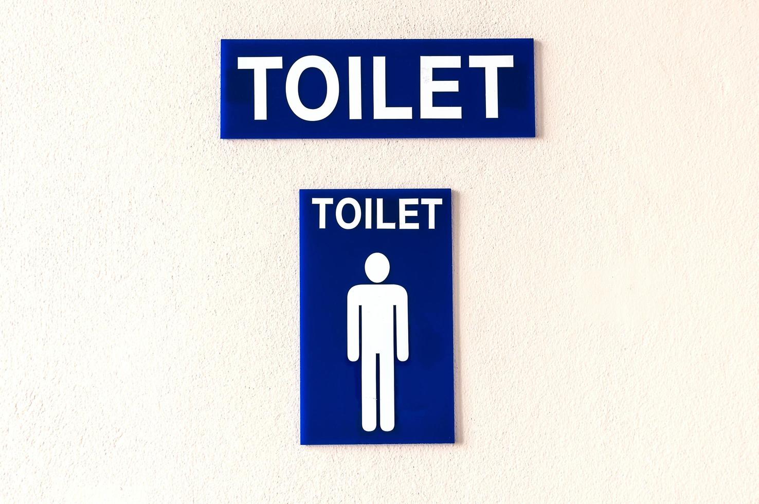 blaues Mann-Toilettenschild foto