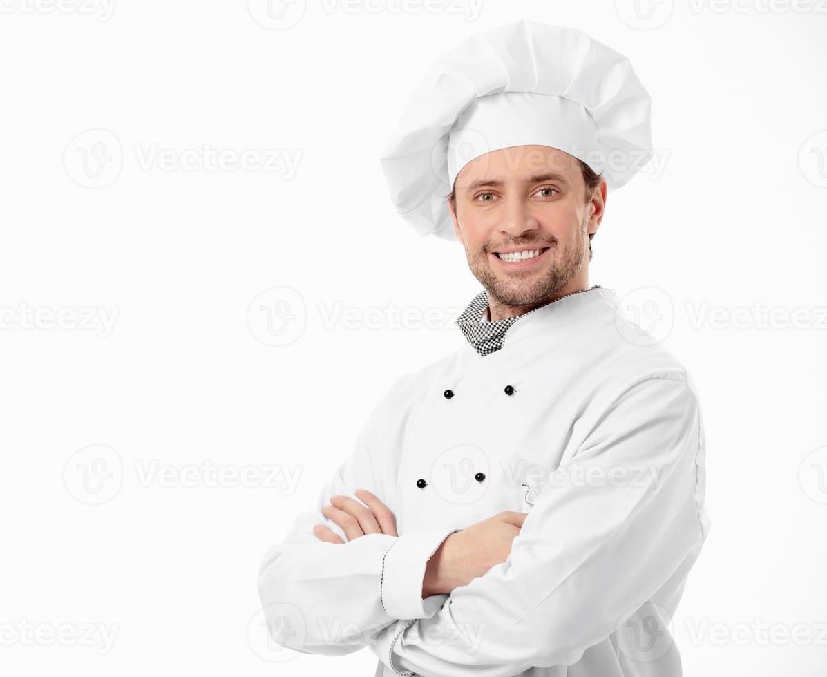 ein lächelnder Koch mit verschränkten Armen foto