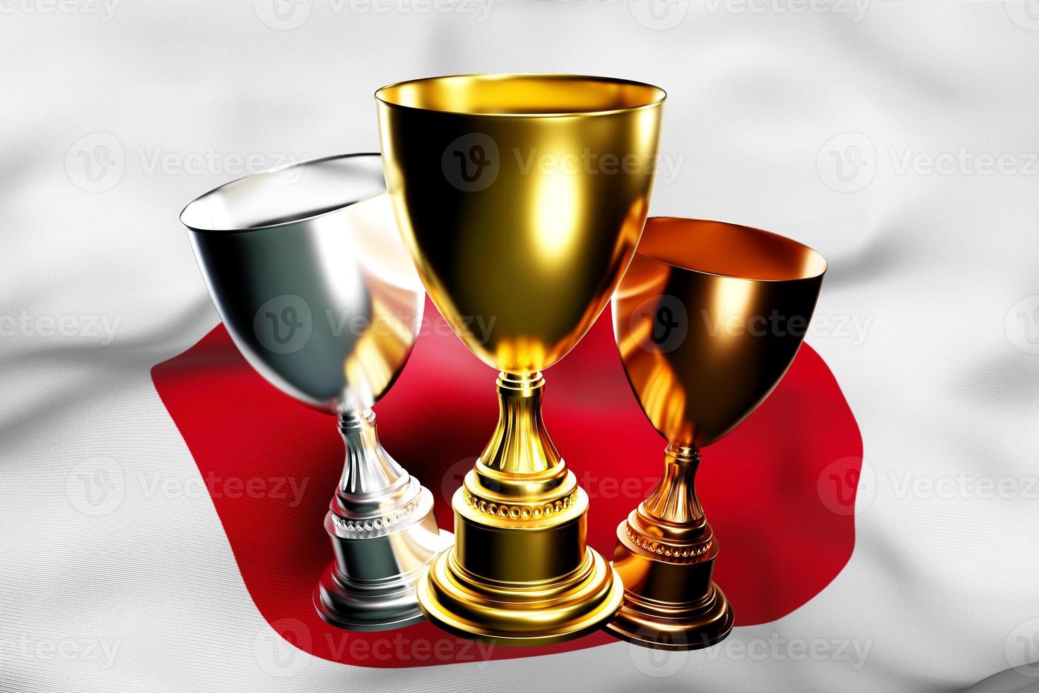 3D-Darstellung eines Pokals mit Gold-, Silber- und Bronzegewinnern auf dem Hintergrund der Nationalflagge Japans. 3D-Visualisierung einer Auszeichnung für sportliche Leistungen foto
