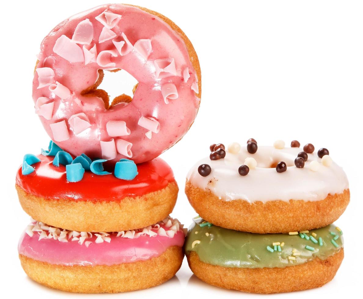 bunte Donuts auf weißem Hintergrund foto