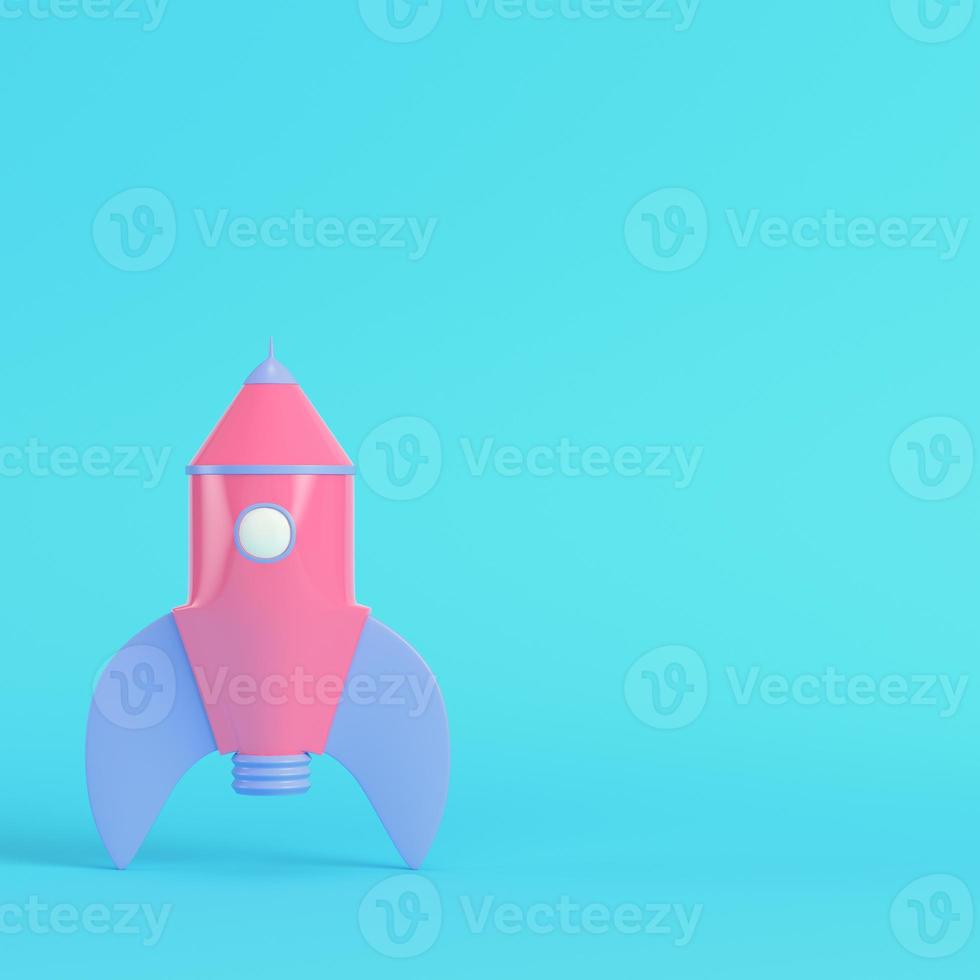 Rakete im rosa Cartoon-Stil auf hellblauem Hintergrund in Pastellfarben foto