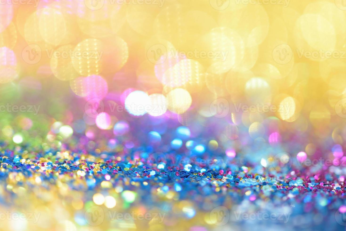 bokeh glitzer bunt verschwommener abstrakter hintergrund für geburtstag, jahrestag, hochzeit, silvester oder weihnachten foto