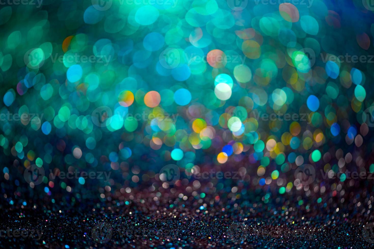 Bokeh-Effekt glitzert bunt verschwommen abstrakter Hintergrund für Geburtstag, Jubiläum, Hochzeit, Silvester oder Weihnachten foto