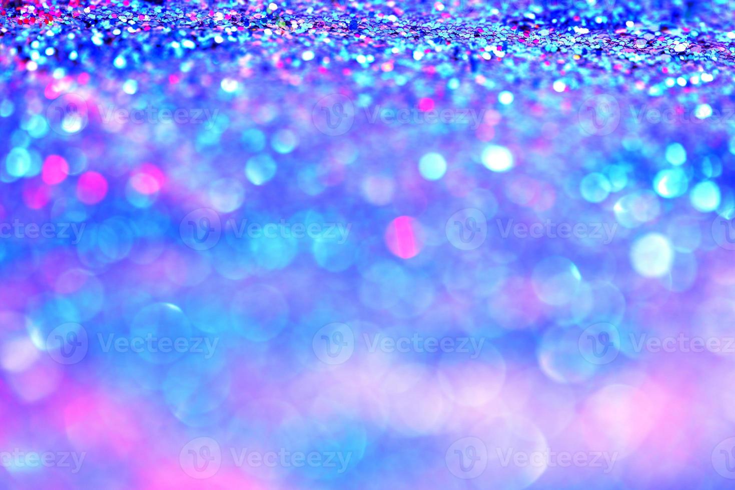 bokeh glitzer bunt verschwommener abstrakter hintergrund für geburtstag, jahrestag, hochzeit, silvester oder weihnachten foto