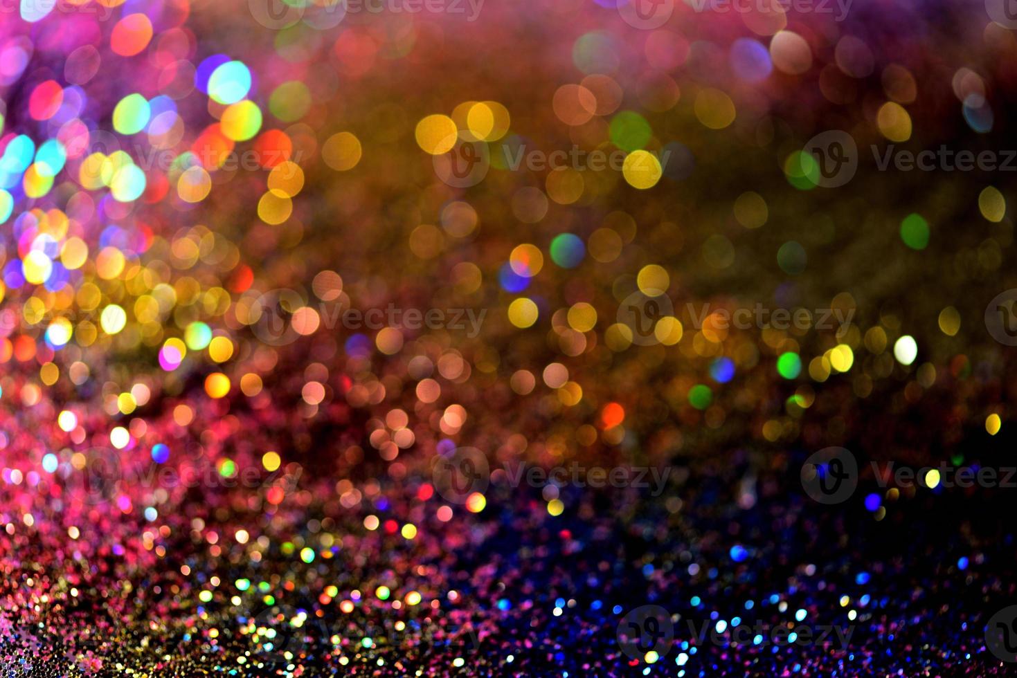 bokeh glitzer bunt verschwommener abstrakter hintergrund für geburtstag, jahrestag, hochzeit, silvester oder weihnachten foto