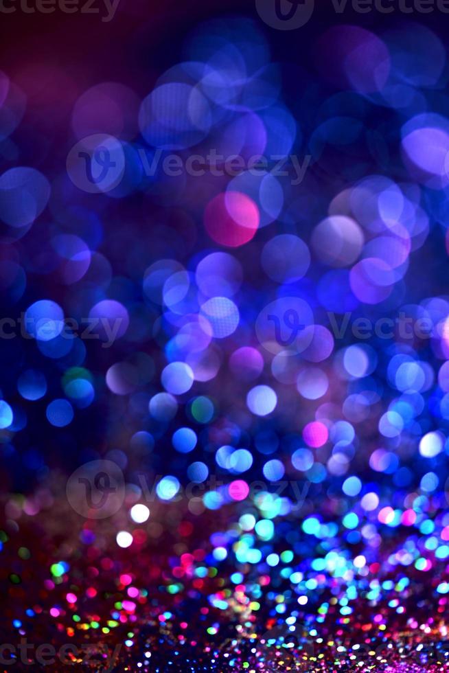 bokeh glitzer bunt verschwommener abstrakter hintergrund für geburtstag, jahrestag, hochzeit, silvester oder weihnachten foto