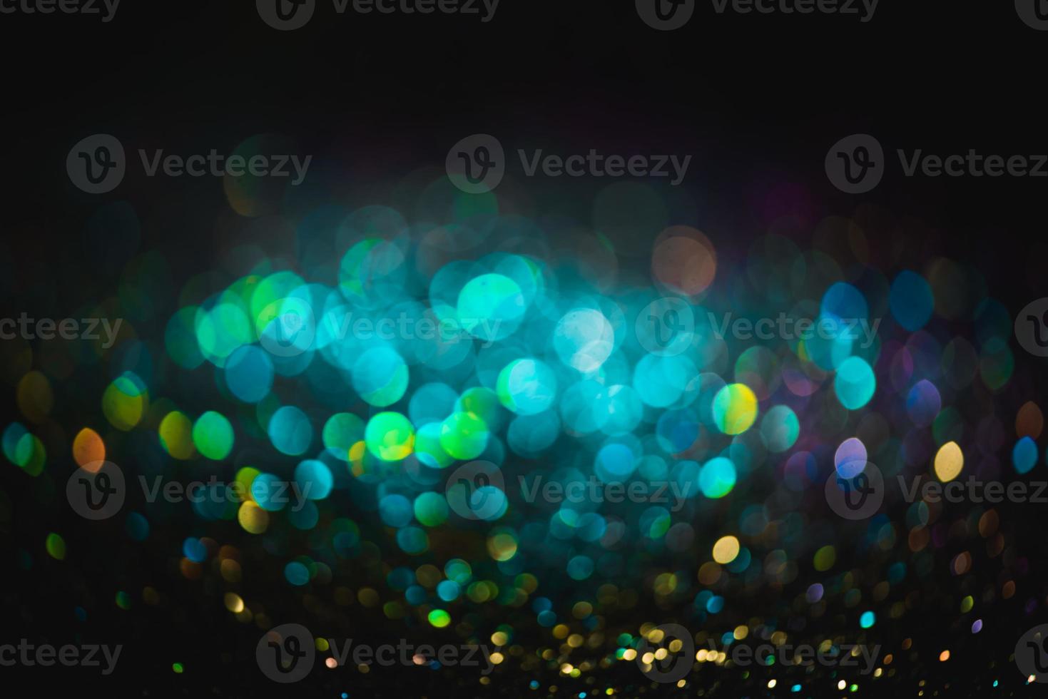 Bokeh-Effekt glitzert bunt verschwommen abstrakter Hintergrund für Geburtstag, Jubiläum, Hochzeit, Silvester oder Weihnachten foto