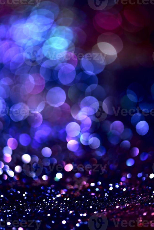 bokeh glitzer bunt verschwommener abstrakter hintergrund für geburtstag, jahrestag, hochzeit, silvester oder weihnachten foto