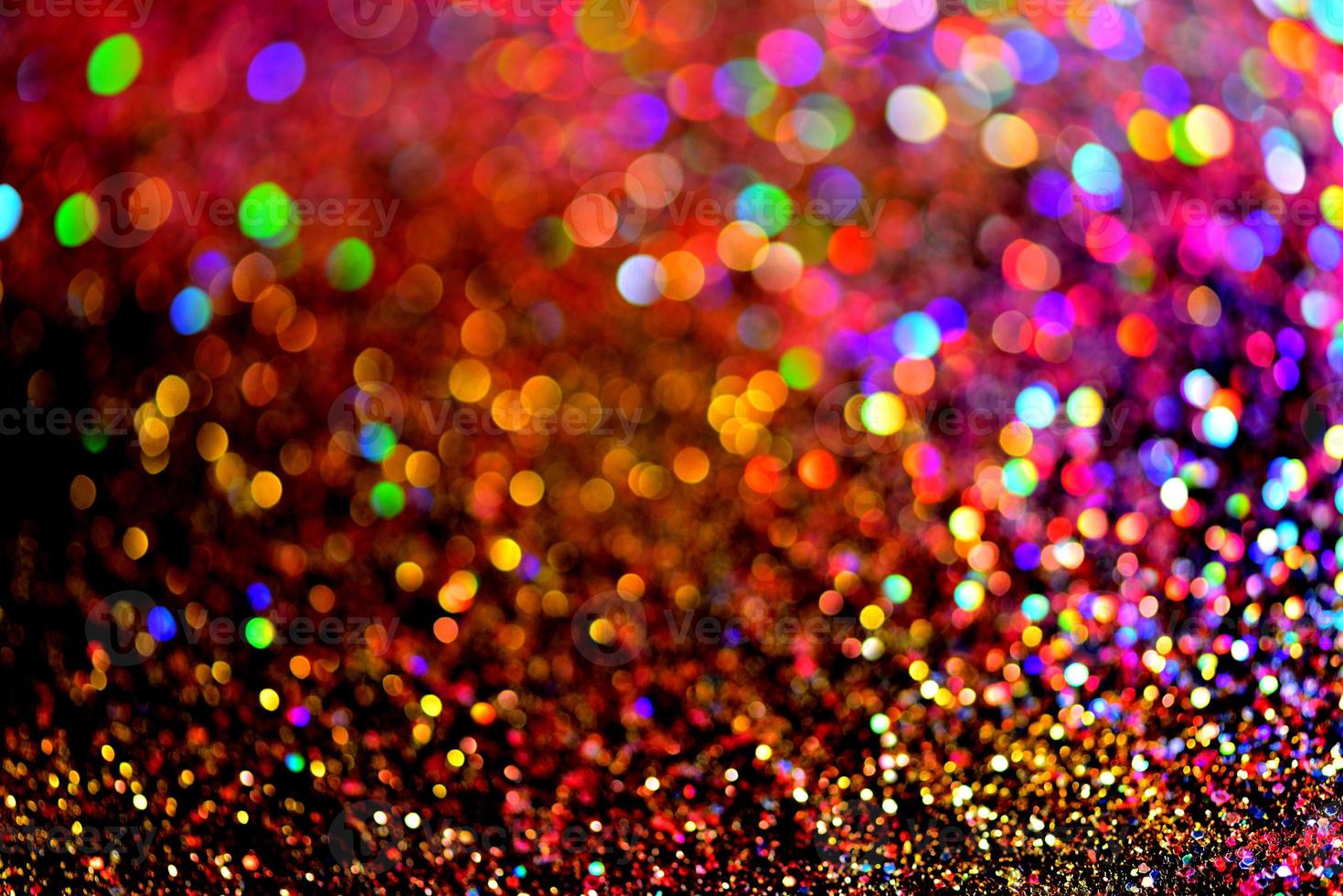 bokeh glitzer bunt verschwommener abstrakter hintergrund für geburtstag, jahrestag, hochzeit, silvester oder weihnachten foto