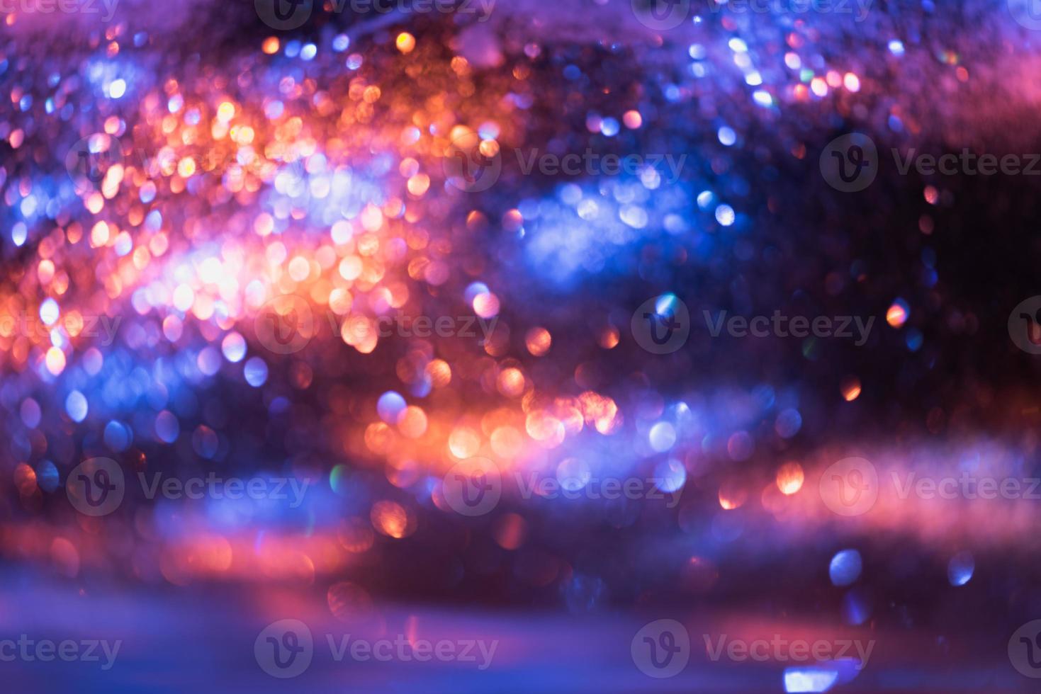 bokeh glitzer bunt verschwommener abstrakter hintergrund für geburtstag, jahrestag, hochzeit, silvester oder weihnachten foto