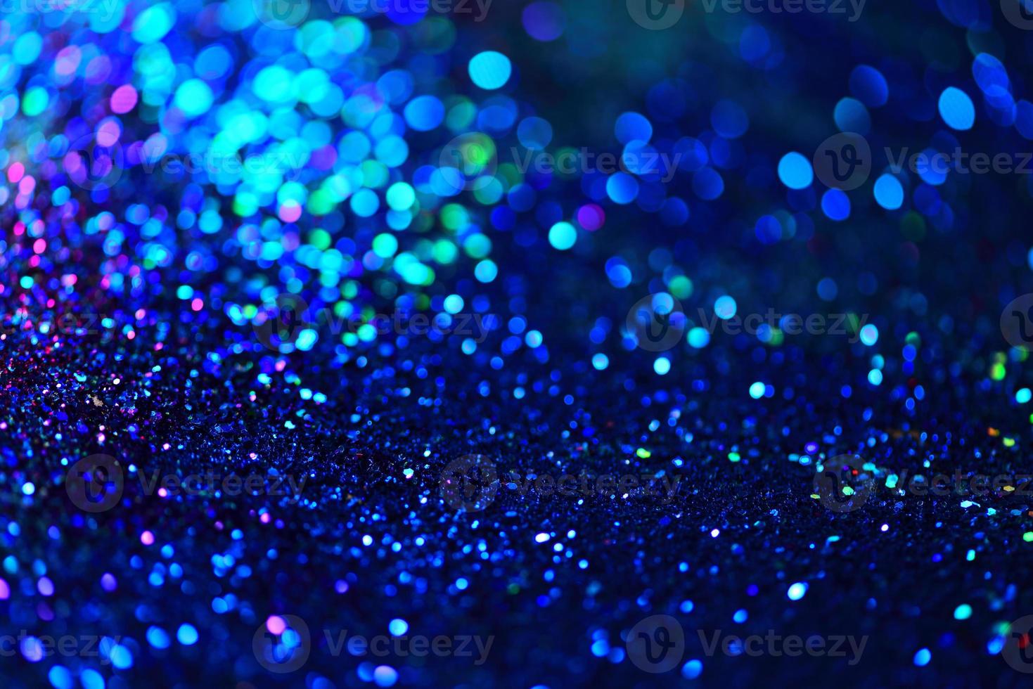 bokeh glitzer bunt verschwommener abstrakter hintergrund für geburtstag, jahrestag, hochzeit, silvester oder weihnachten foto