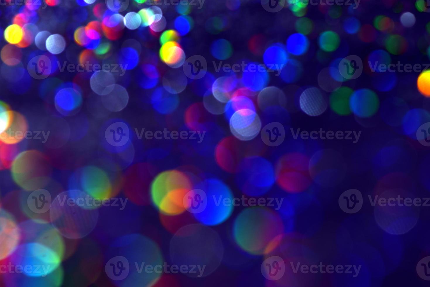 bokeh glitzer bunt verschwommener abstrakter hintergrund für geburtstag, jahrestag, hochzeit, silvester oder weihnachten foto