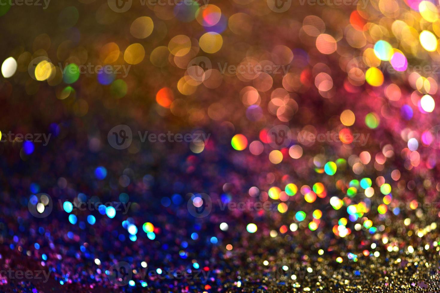 bokeh glitzer bunt verschwommener abstrakter hintergrund für geburtstag, jahrestag, hochzeit, silvester oder weihnachten foto