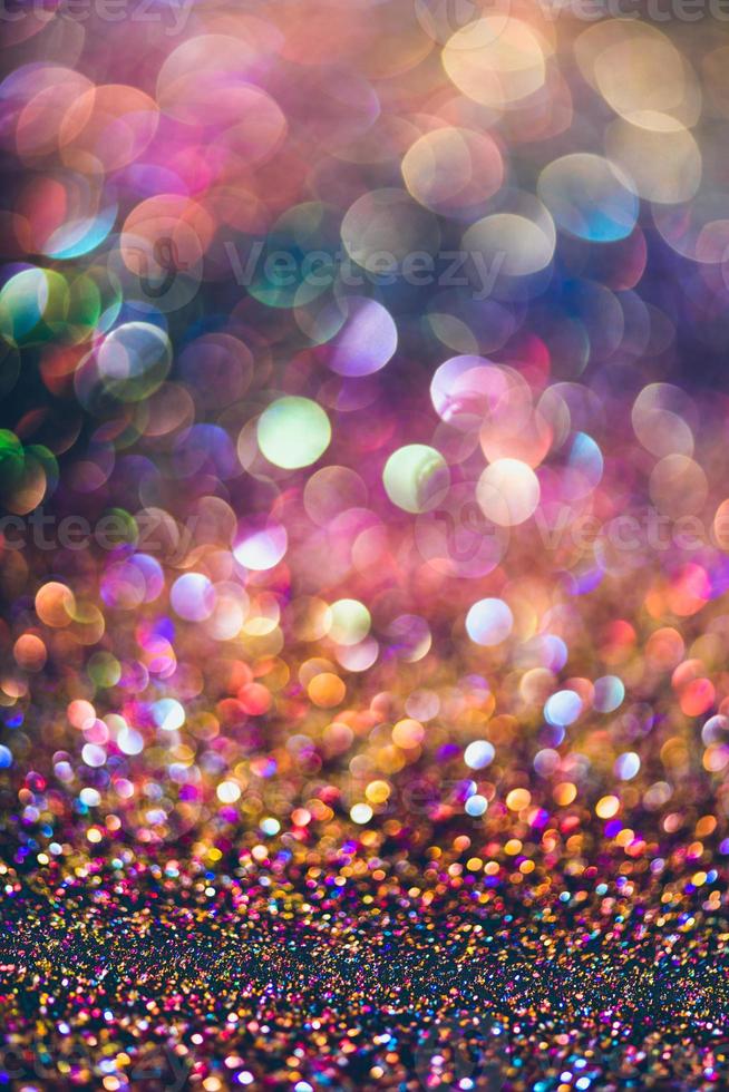 bokeh glitzer bunt verschwommener abstrakter hintergrund für geburtstag, jahrestag, hochzeit, silvester oder weihnachten foto