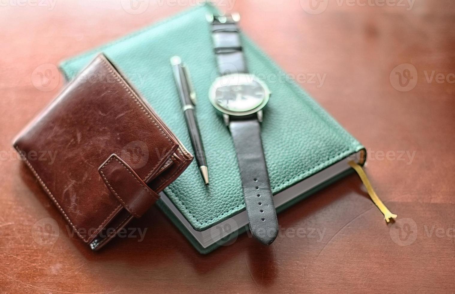 Satz Männer Tagebuch Brieftasche Uhren foto