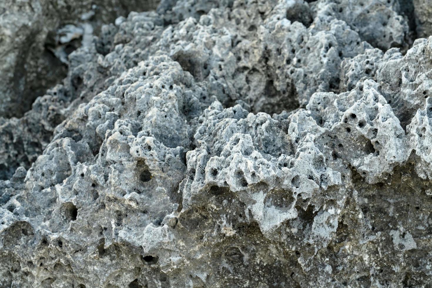 Nahaufnahme grauer Eruptivgestein Hintergrund foto