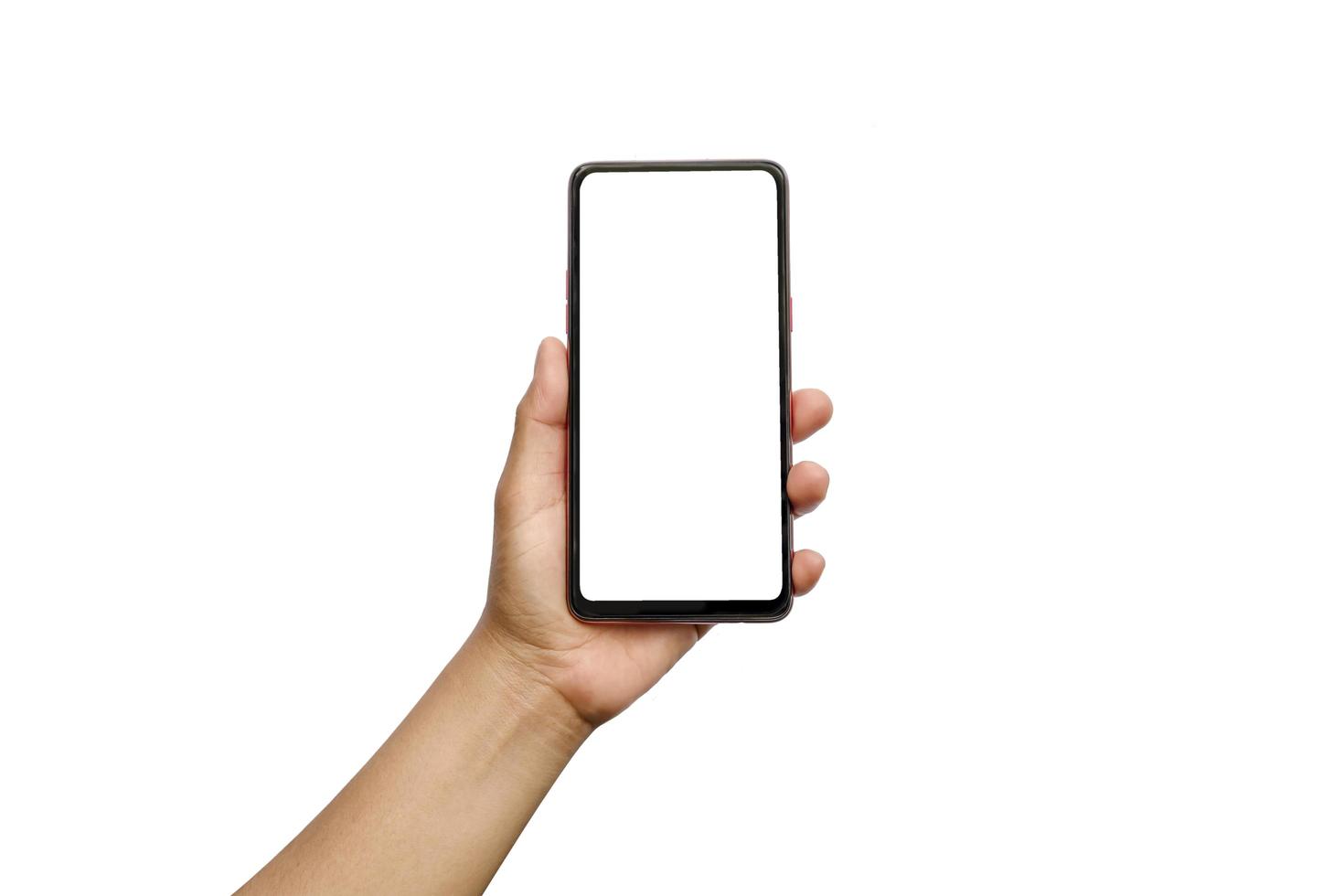Hand, die Handy mit leerem Bildschirm auf weißem Hintergrund hält. isoliert. foto